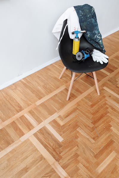 Herringbone pattern tile floor installation