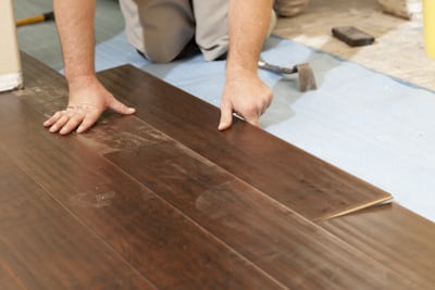 Tile floor installation in progress